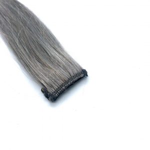 Grey Highlights Human hair clip-in extensions.
